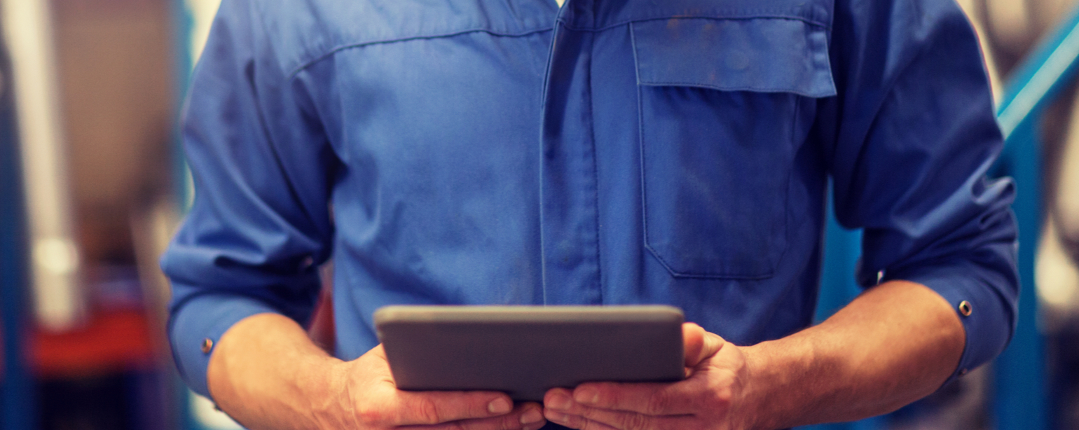 maintenance worker using tablet in building fb
