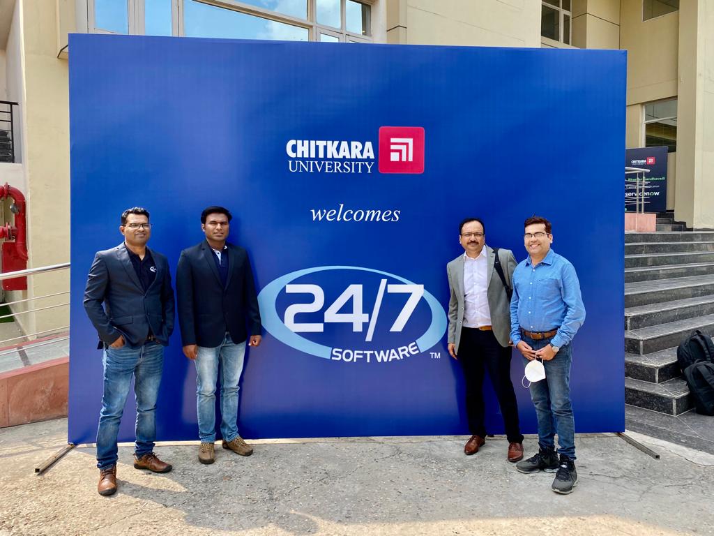 24/7 Software team at a conference